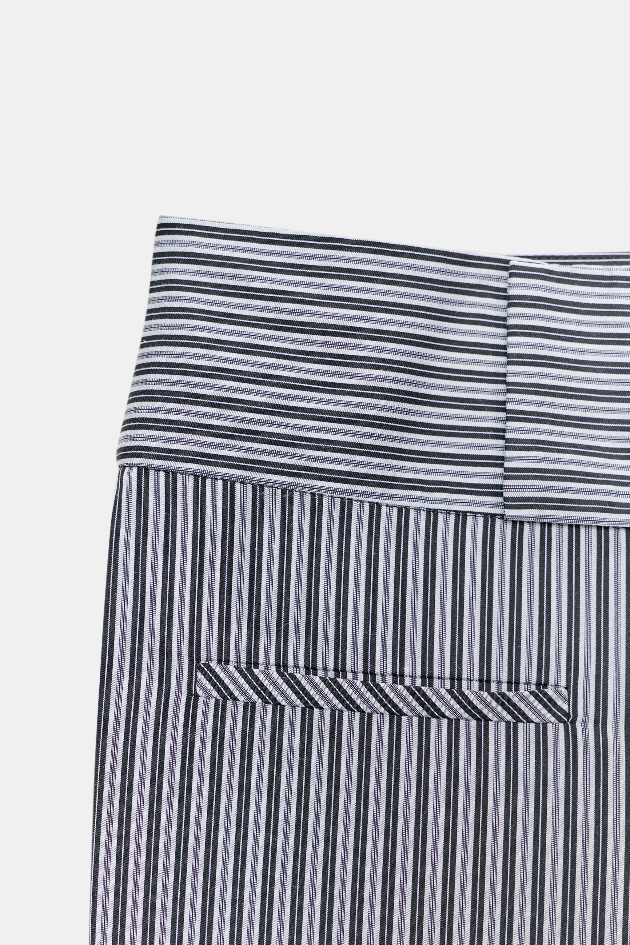PANTALON FLARE À RAYURES